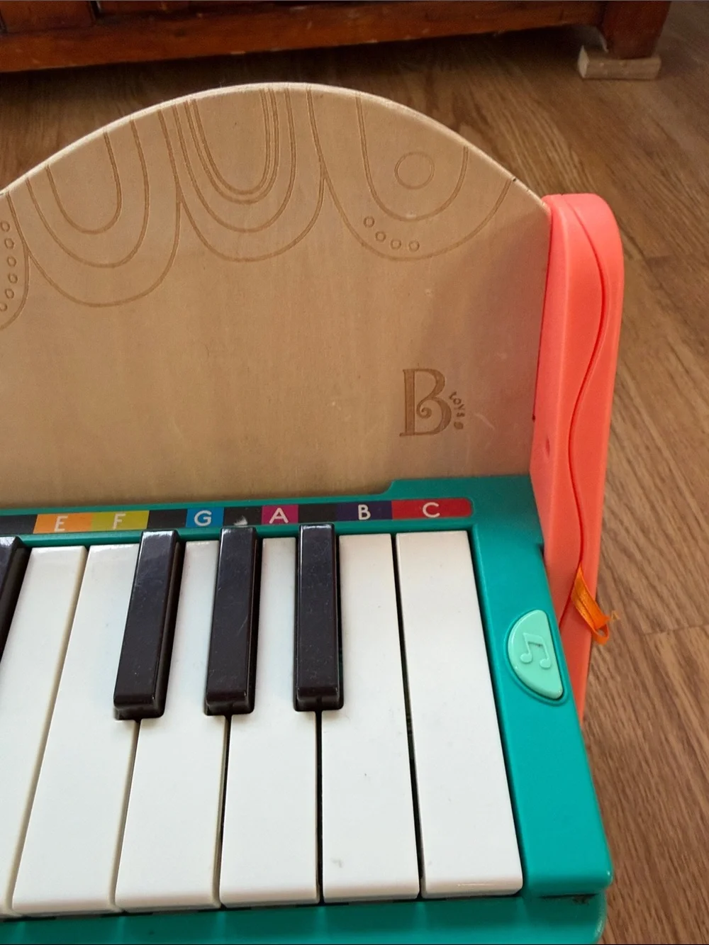 B Toys Mini Maestro Wooden Toy Piano in Teal and Coral